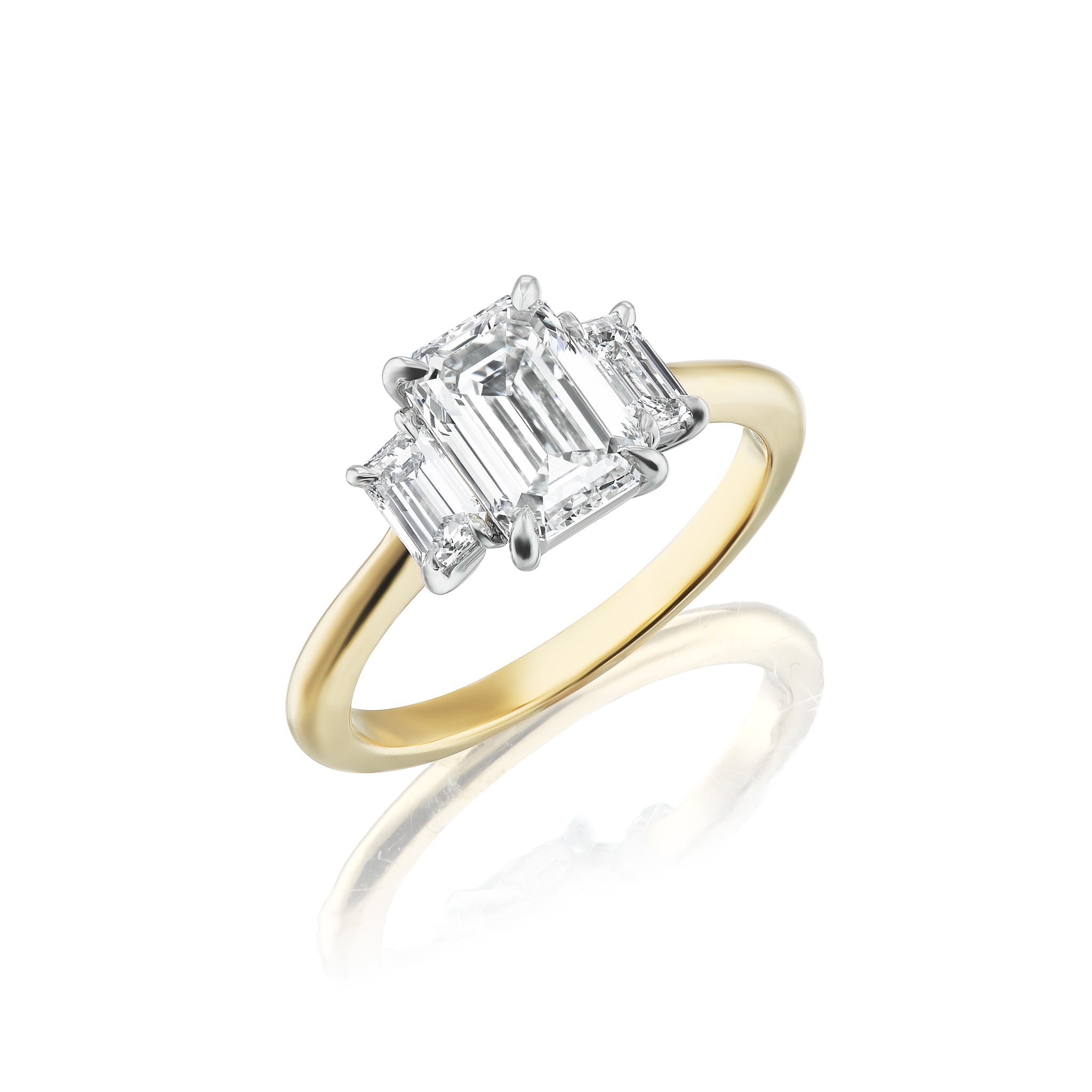 Platinum Three Stone Emerald Cut Ring